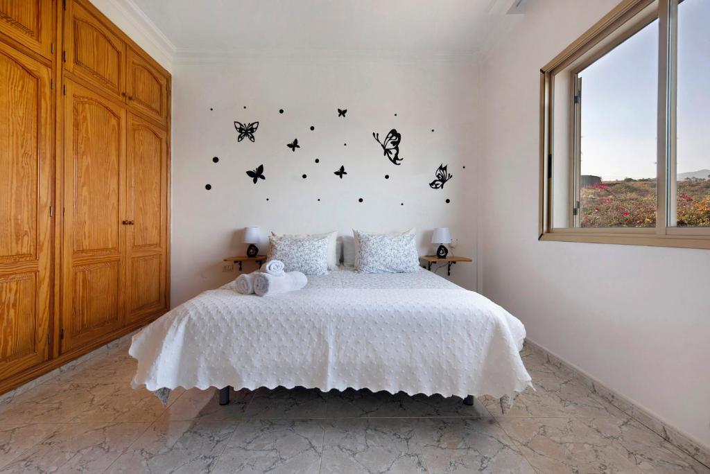 A bed or beds in a room at Jalón de Cameros