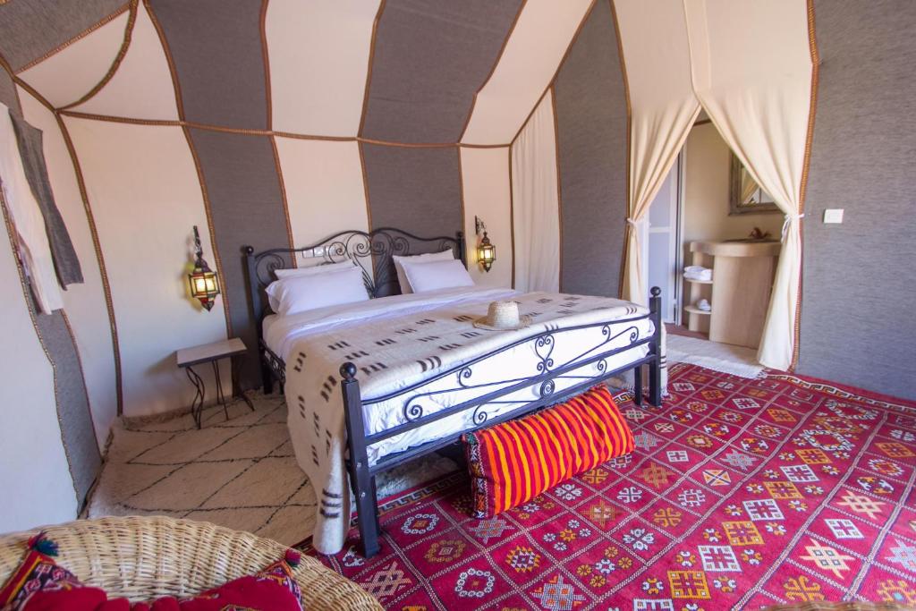 Giường trong phòng chung tại Asama Luxury Camp