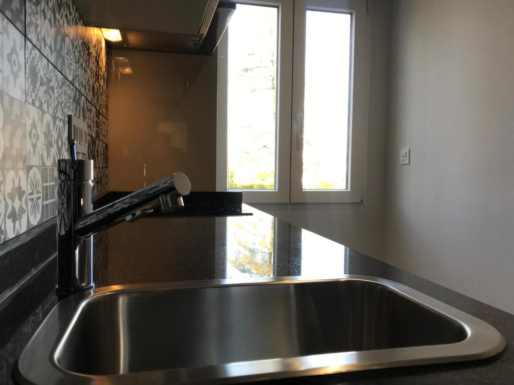 Kuchyňa alebo kuchynka v ubytovaní Apartamentos Ciudad de Ronda