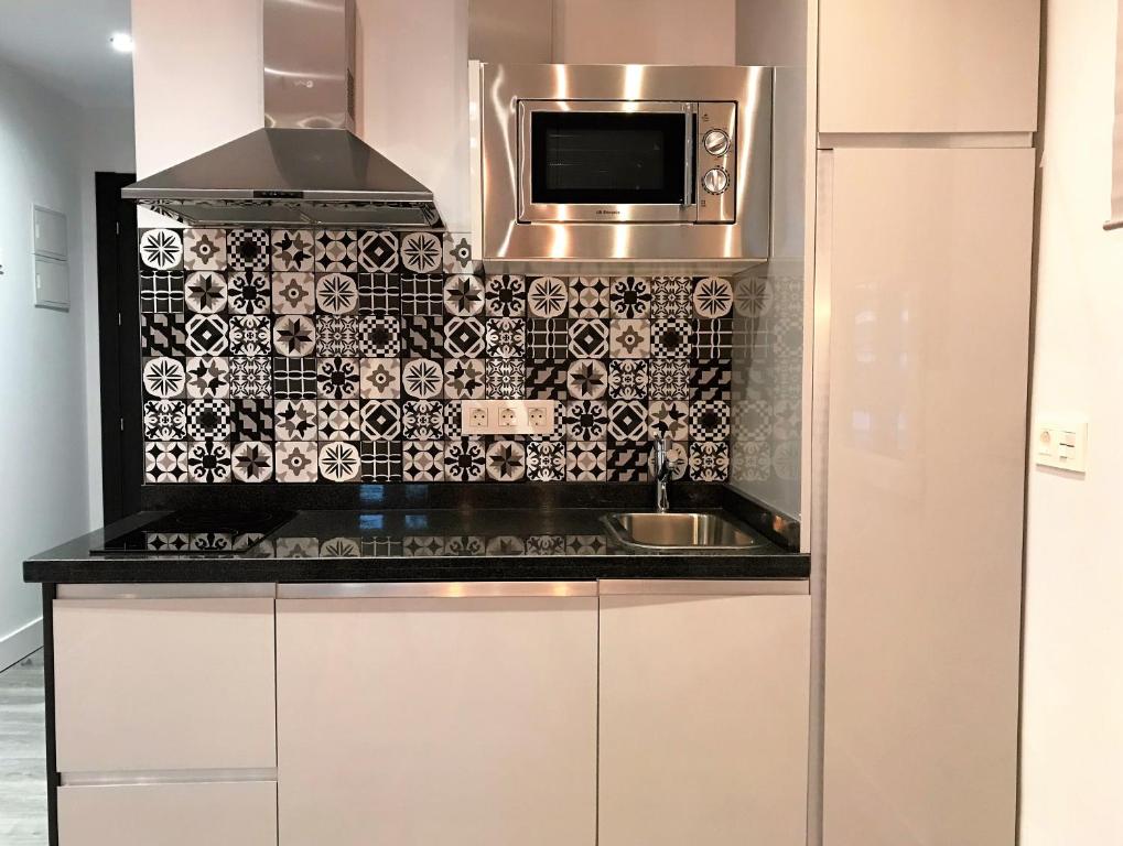 Kuchyňa alebo kuchynka v ubytovaní Apartamentos Ciudad de Ronda