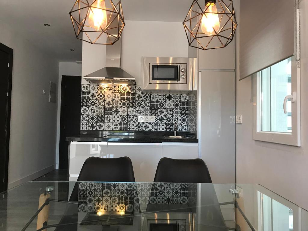 Kuchyňa alebo kuchynka v ubytovaní Apartamentos Ciudad de Ronda