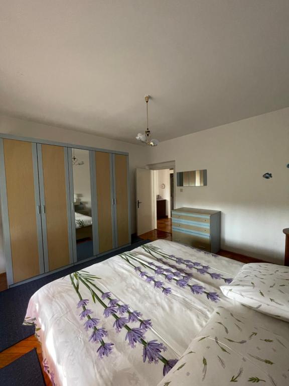 Postel nebo postele na pokoji v ubytování Apartmani Pavat