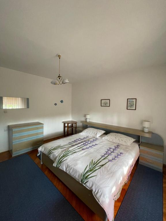 Postel nebo postele na pokoji v ubytování Apartmani Pavat