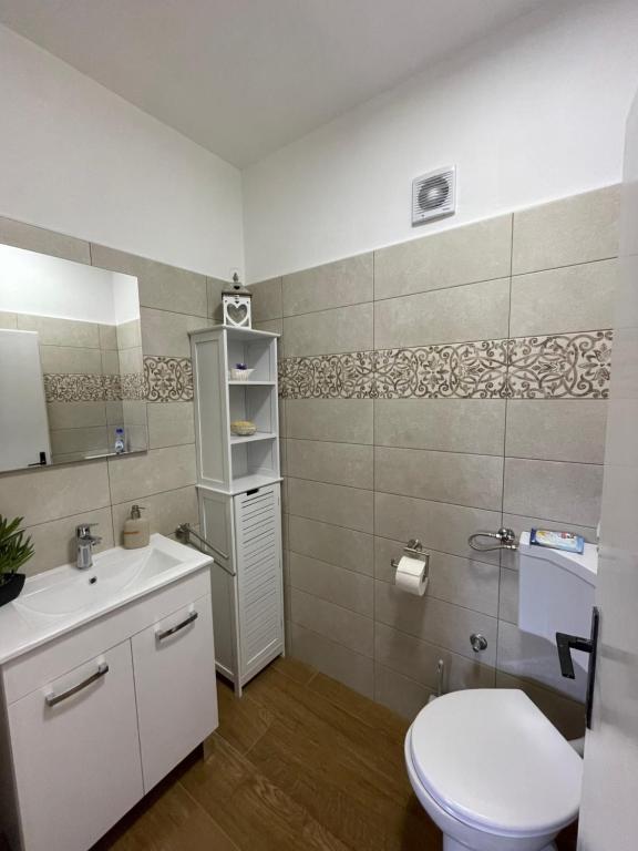 Koupelna v ubytování Apartmani Pavat