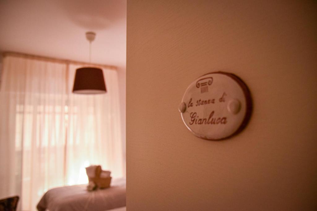 Postel nebo postele na pokoji v ubytování A Casa dei Bruno B&B