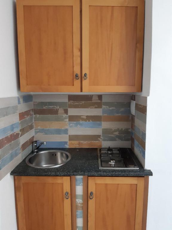 Kuchyň nebo kuchyňský kout v ubytování Guidonia Montecelio
