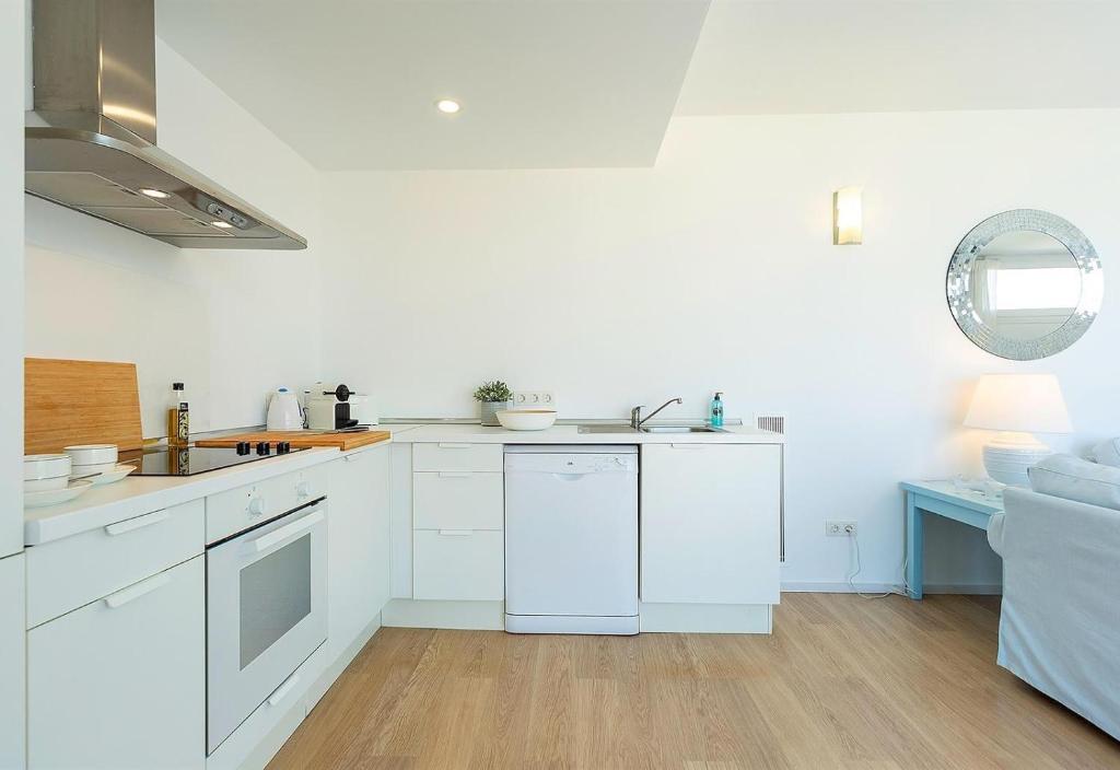 A kitchen or kitchenette at Sea View House with terrace