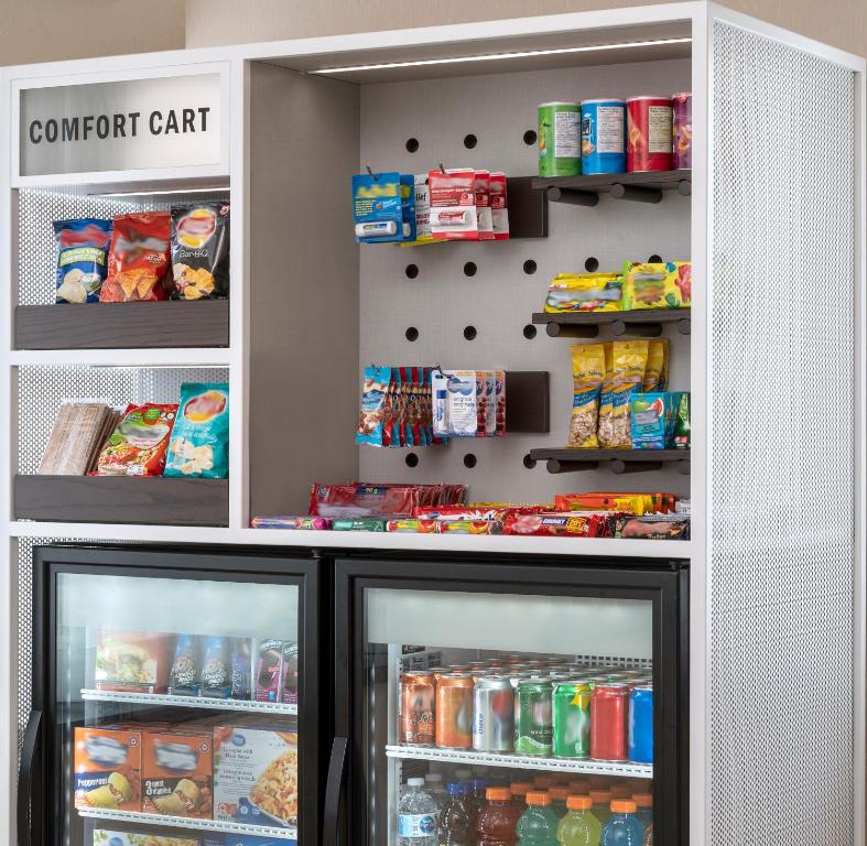 a refrigerator filled with lots of food and drinks at Comfort Inn in Ottawa
