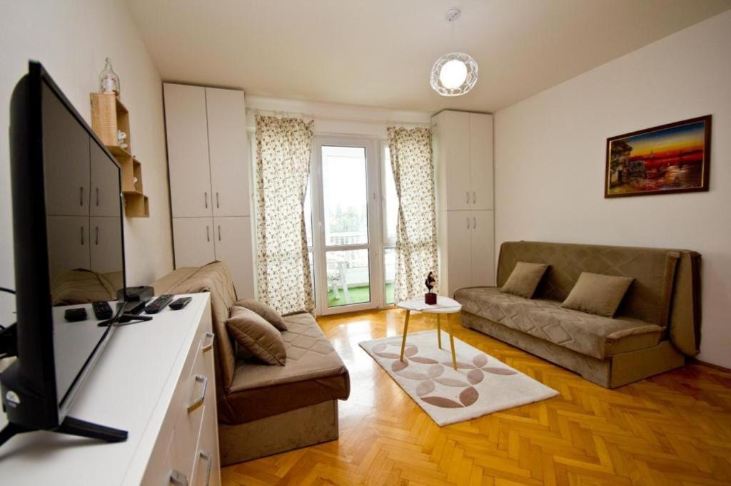 TV a/nebo společenská místnost v ubytování Apartment Terassa