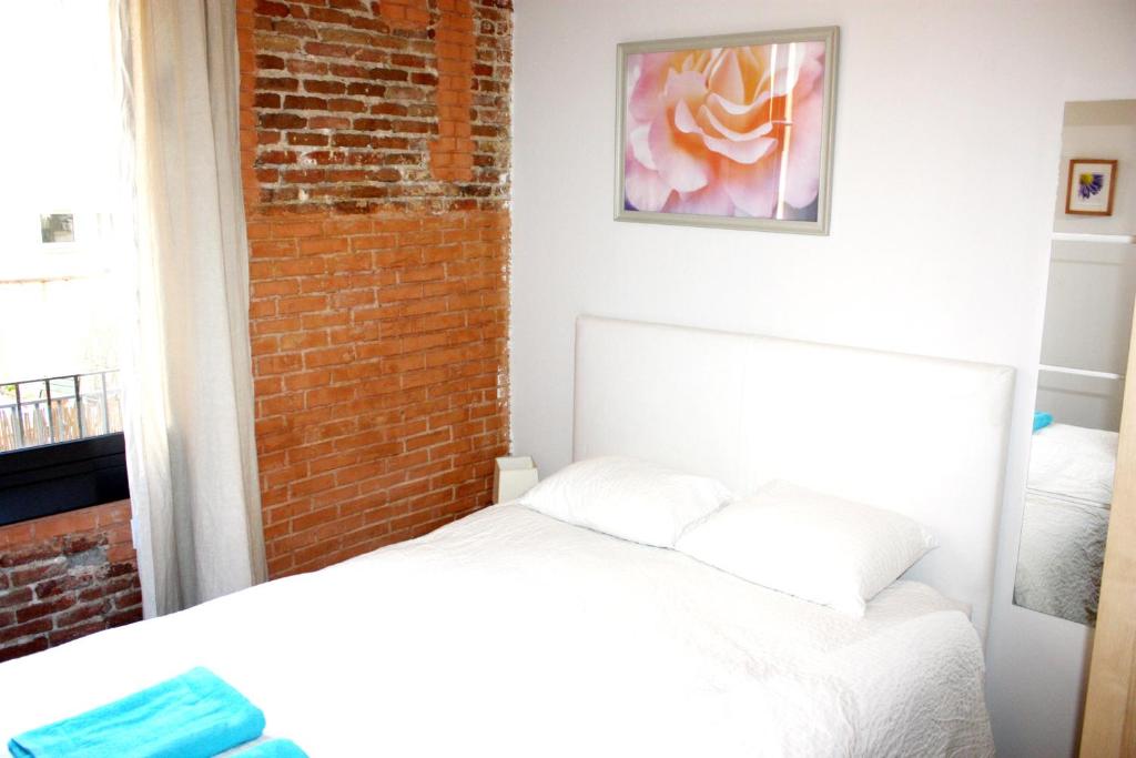 Posteľ alebo postele v izbe v ubytovaní Bcn-rentals apartments in the Old town