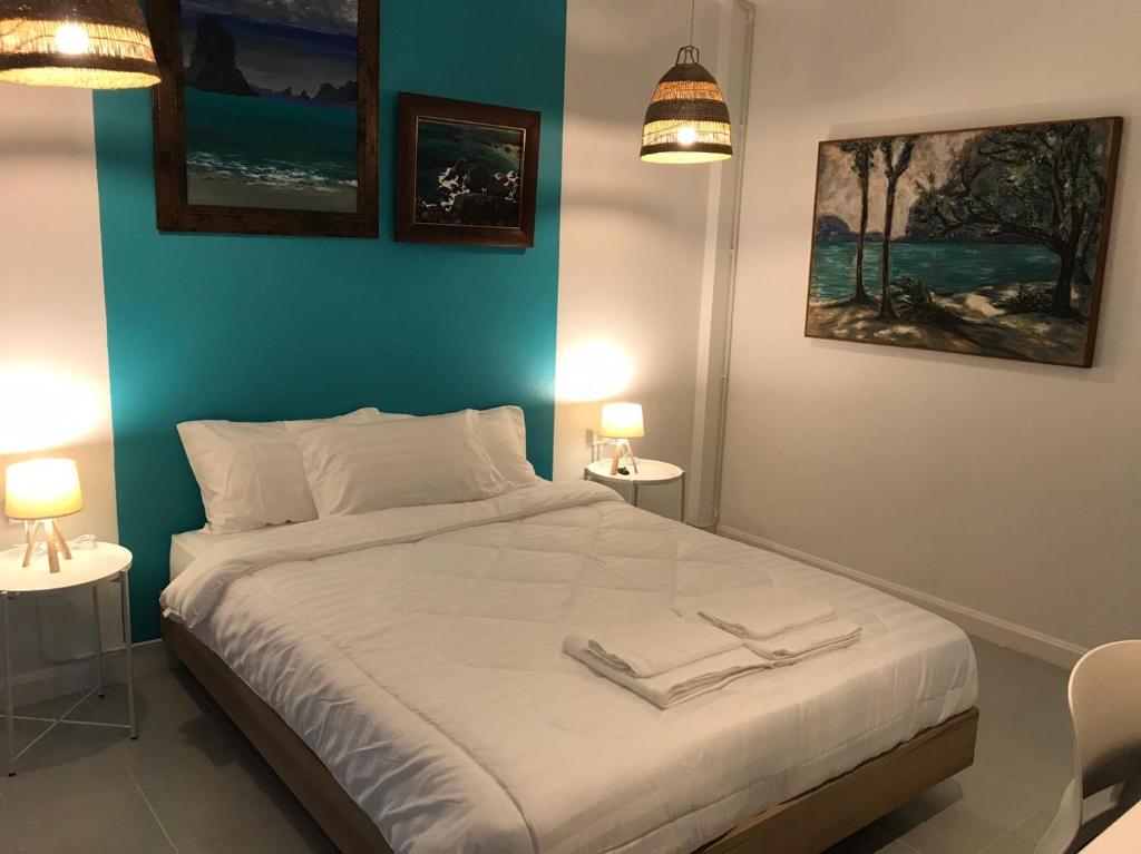 Postel nebo postele na pokoji v ubytování Baan Suandao Wat Arun
