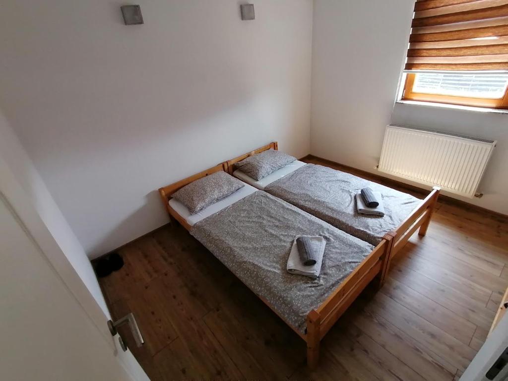 Postel nebo postele na pokoji v ubytování Rooms Delux Sarajevo