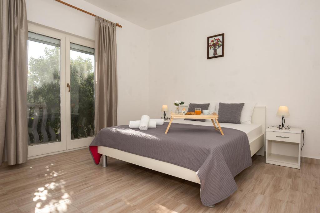 Posteľ alebo postele v izbe v ubytovaní Holiday House San Mario - Pets Friendly Rural Home