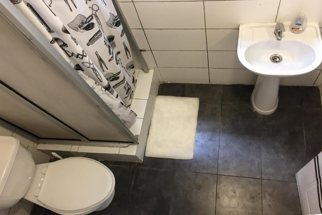 Koupelna v ubytování Hostal Po
