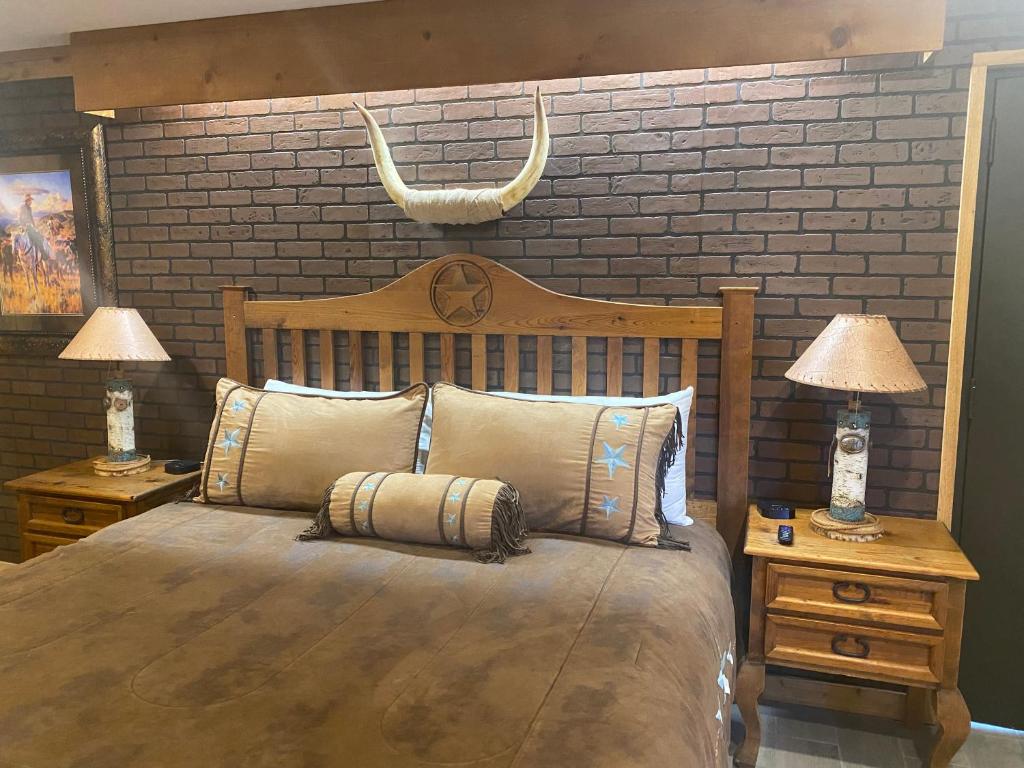 Letto o letti in una camera di The Big Texan Motel
