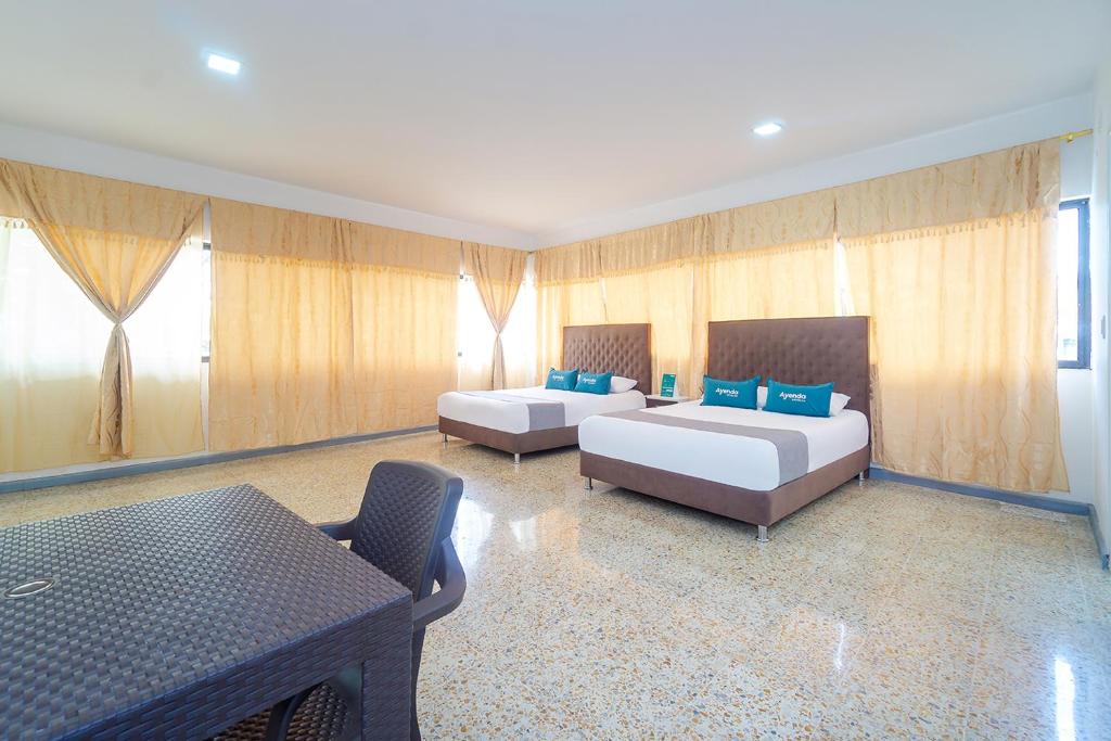 Ayenda Hotel Paraiso Chipichape - 四倍房间