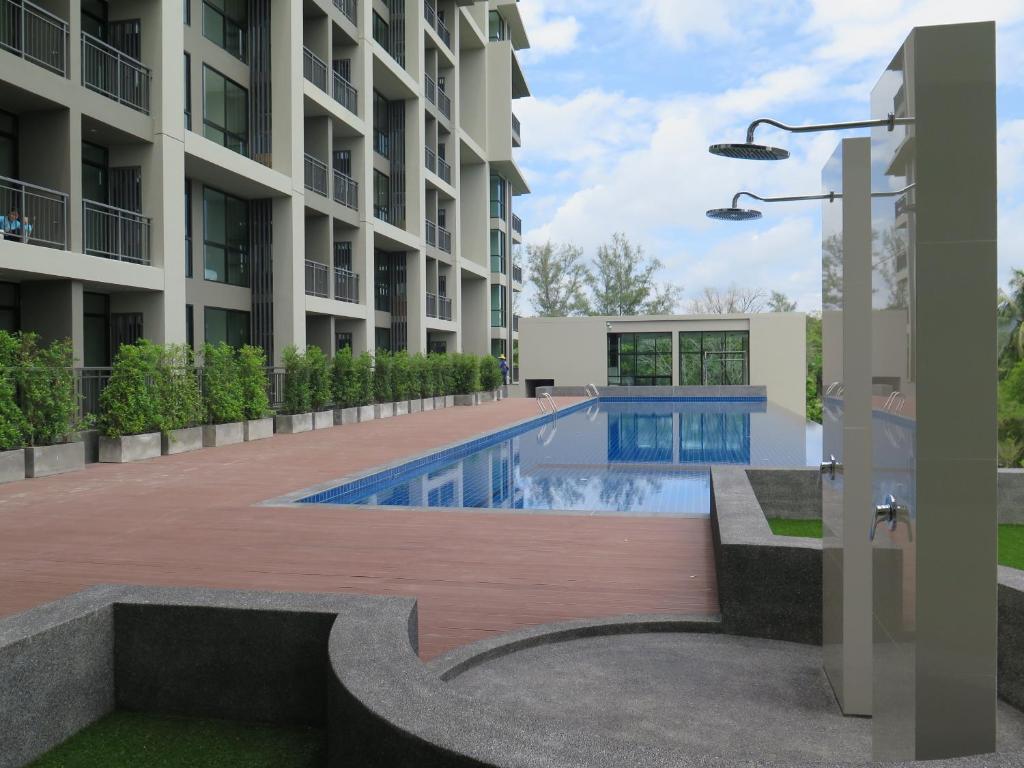 Bazén v ubytování Sugar Palm Residence nebo v jeho okolí