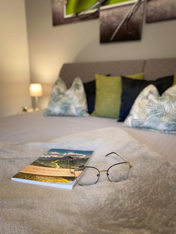 Postel nebo postele na pokoji v ubytování Apartment Bergfeeling