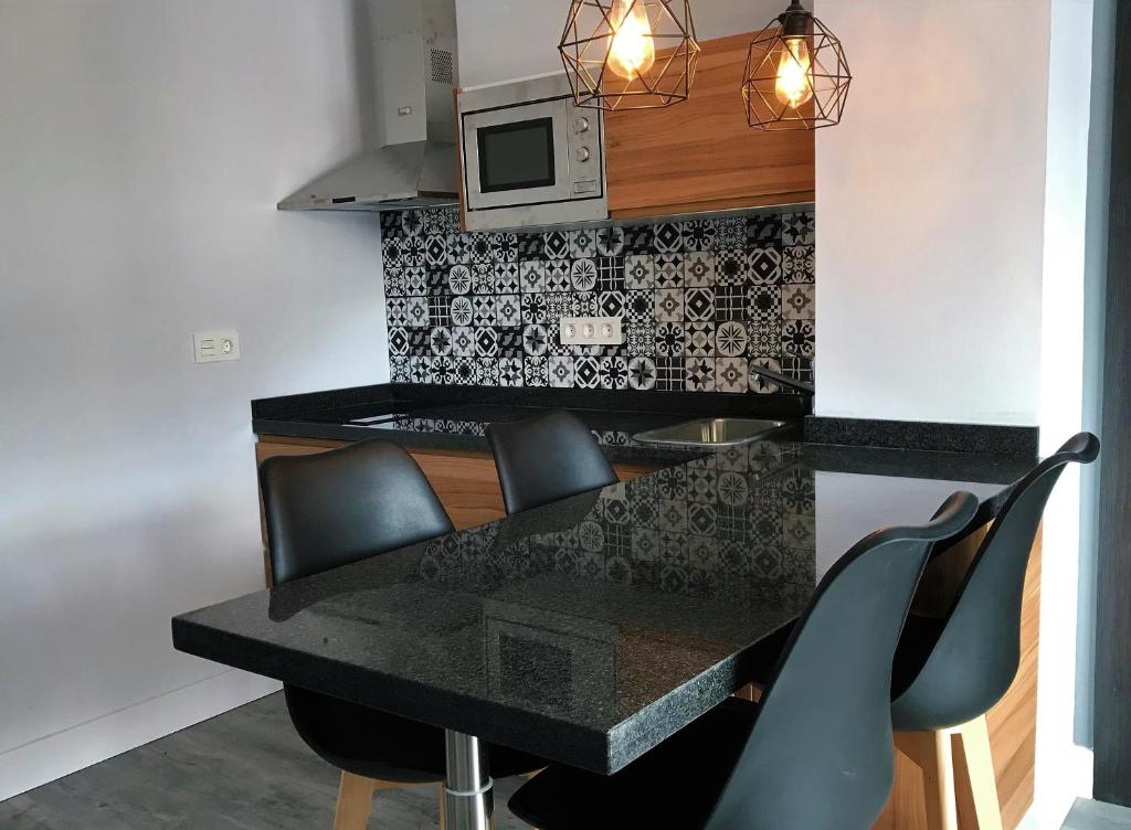 Kuchyňa alebo kuchynka v ubytovaní Apartamentos Ciudad de Ronda