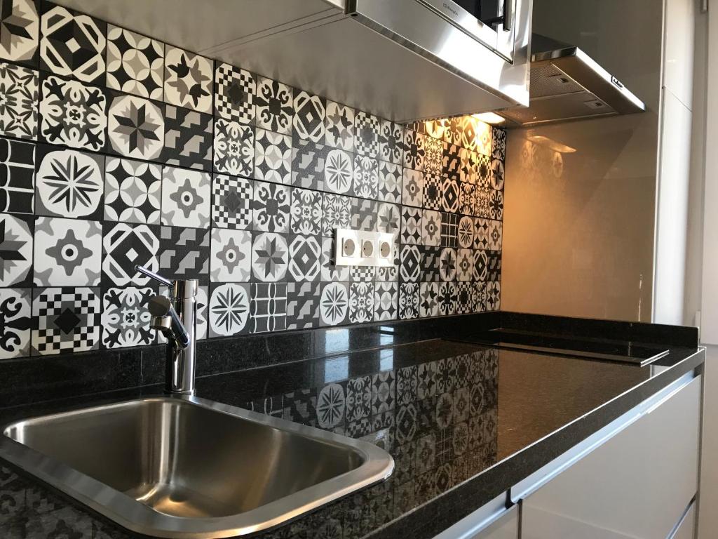 Kuchyňa alebo kuchynka v ubytovaní Apartamentos Ciudad de Ronda