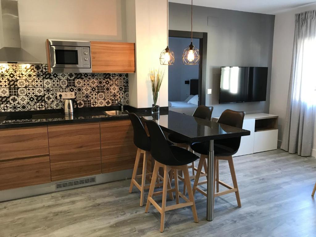 Kuchyňa alebo kuchynka v ubytovaní Apartamentos Ciudad de Ronda
