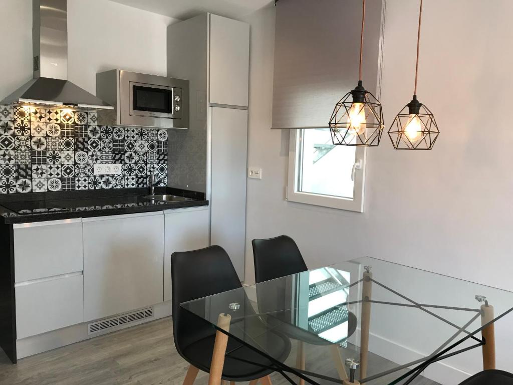 Kuchyňa alebo kuchynka v ubytovaní Apartamentos Ciudad de Ronda
