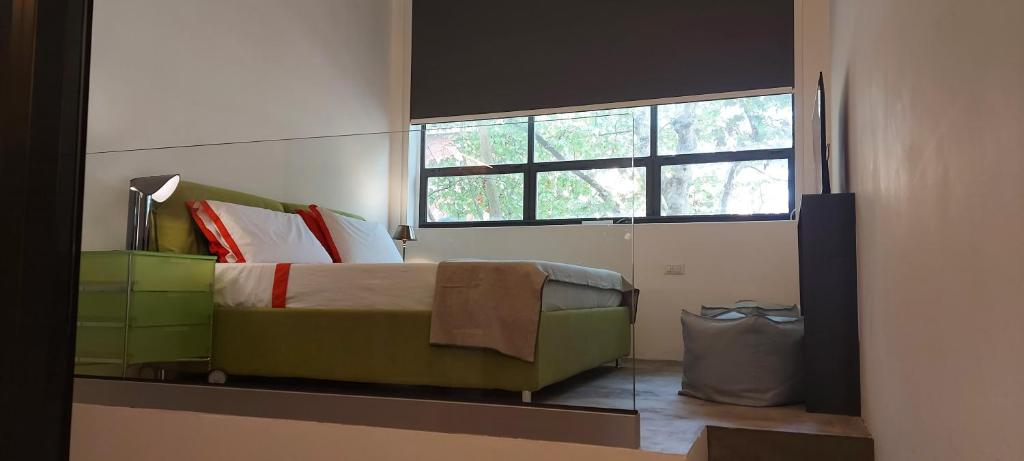 Posteľ alebo postele v izbe v ubytovaní Loft 19