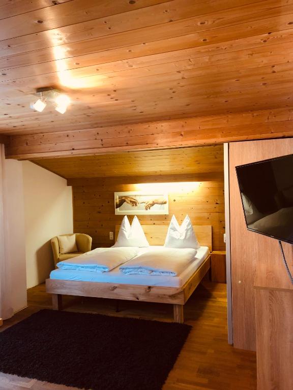 Posteľ alebo postele v izbe v ubytovaní Haus Plangger