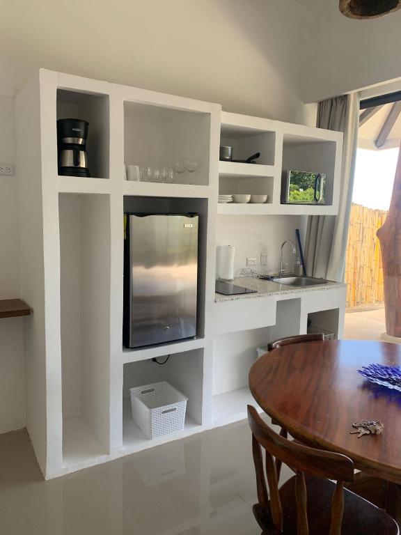 Kuchyň nebo kuchyňský kout v ubytování Akua Suites Ocean View