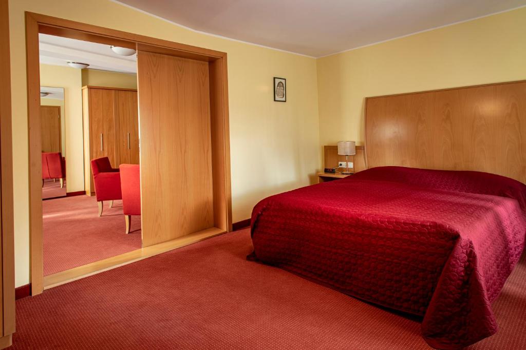 Voodi või voodid majutusasutuse Hotel Erbenhof toas