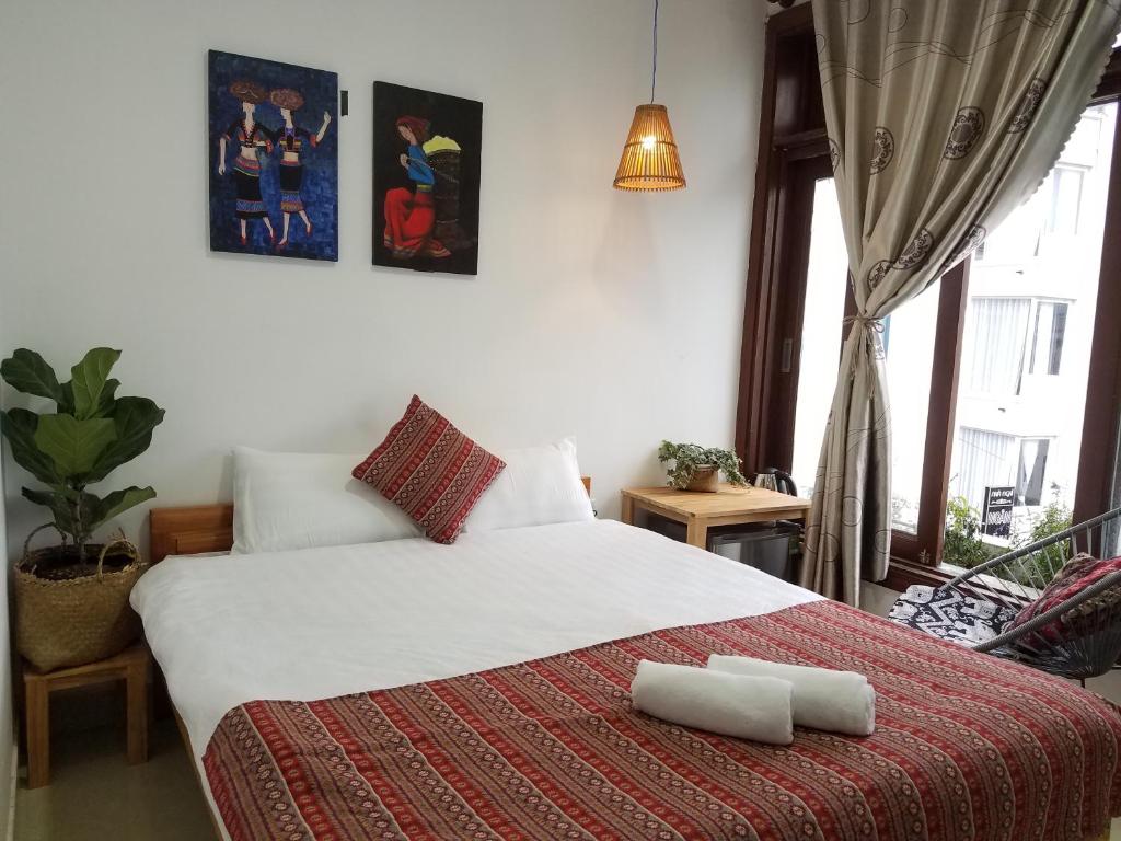 Postel nebo postele na pokoji v ubytování Hotel Làng Kò Hơ