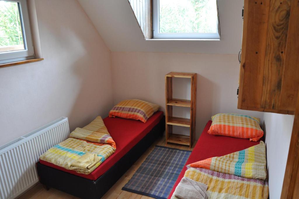 Postel nebo postele na pokoji v ubytování András penzión