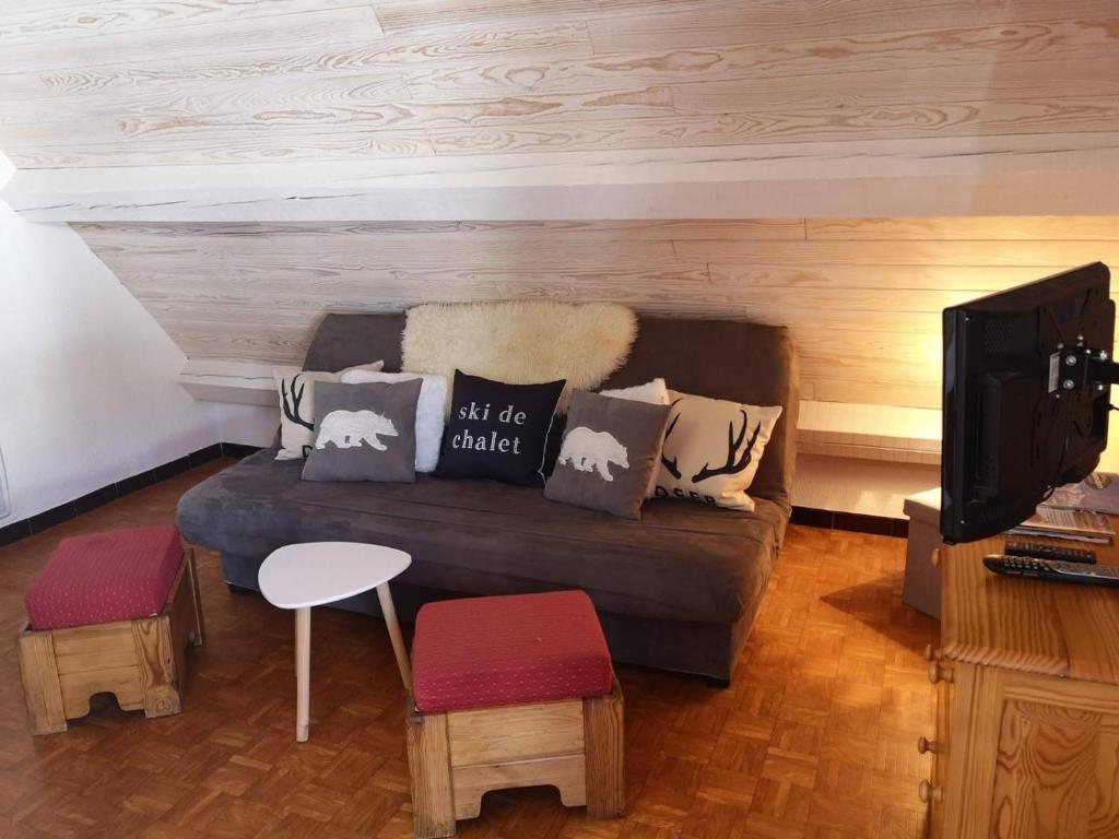 Appartement Cosy 4 à 6 places - cœur de station - vue Montagneにあるシーティングエリア