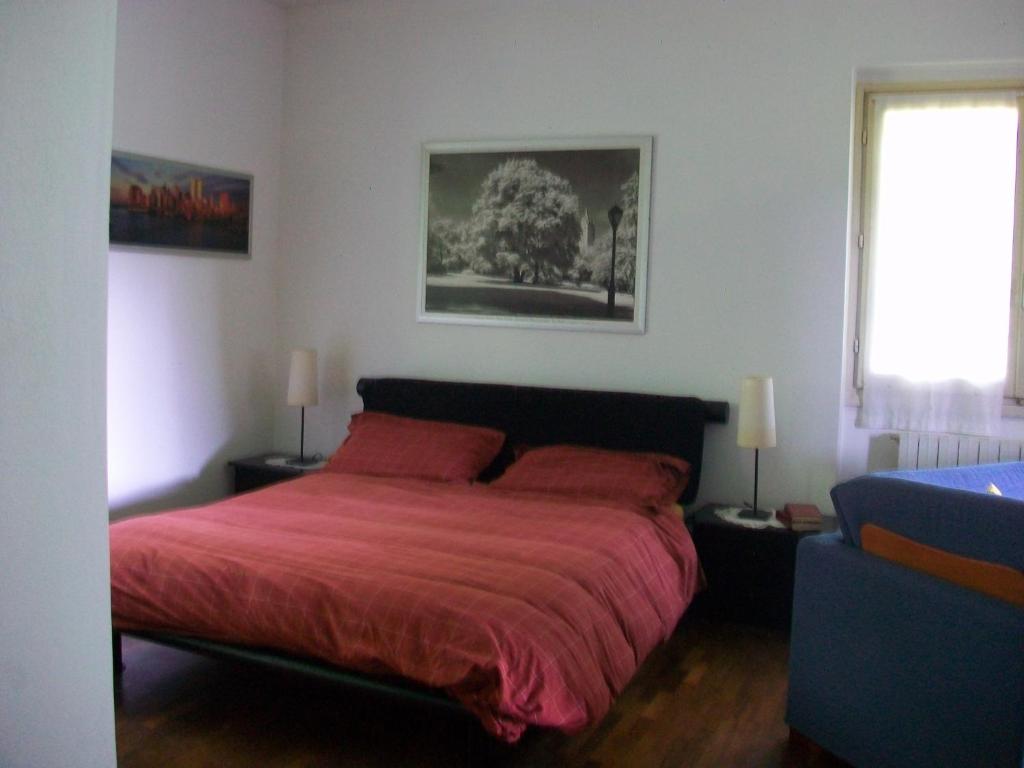 Postel nebo postele na pokoji v ubytování B&B L'Albero Maestro