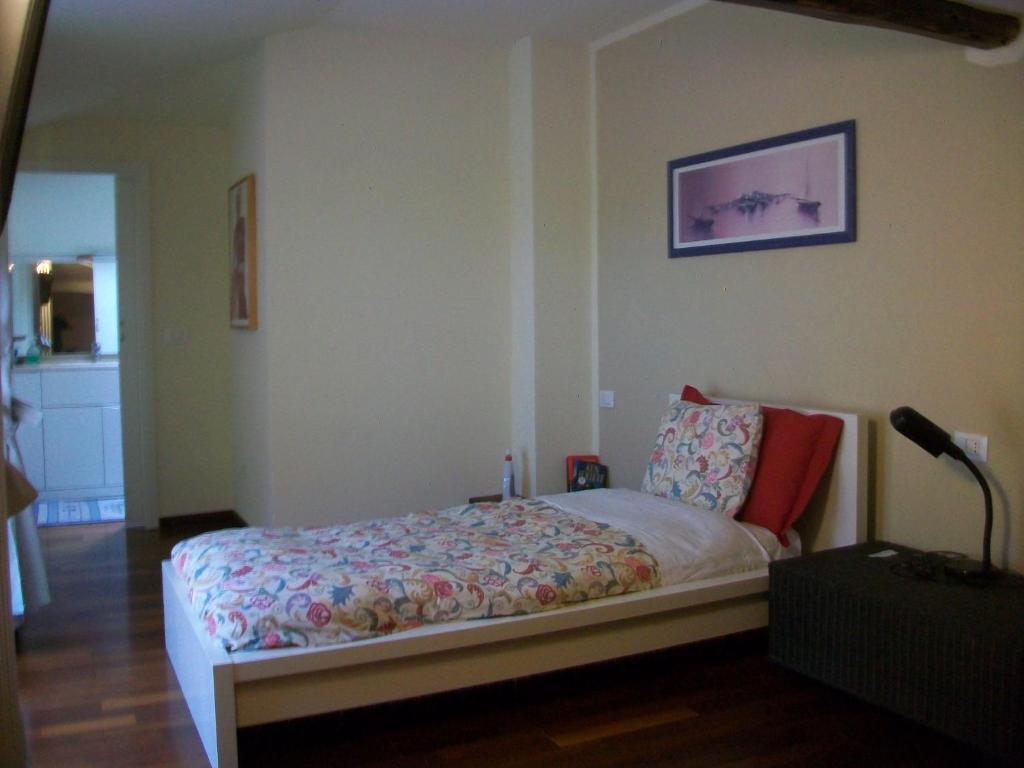 Postel nebo postele na pokoji v ubytování B&B L'Albero Maestro