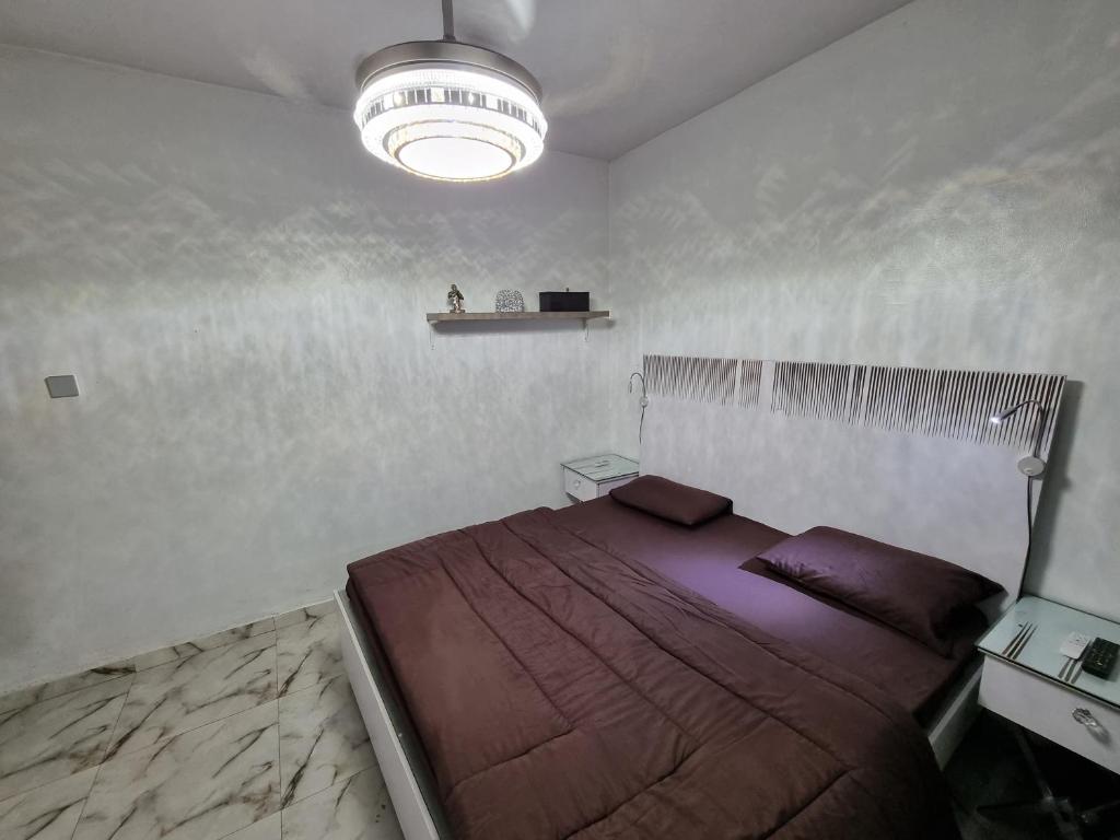 Postel nebo postele na pokoji v ubytování CG Apartments Metro