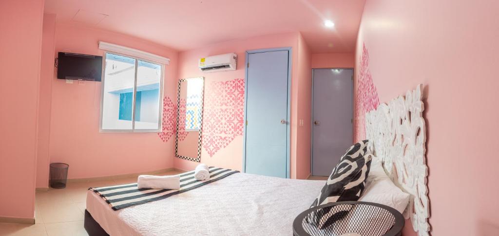 TV a/nebo společenská místnost v ubytování San Felicin Hostel