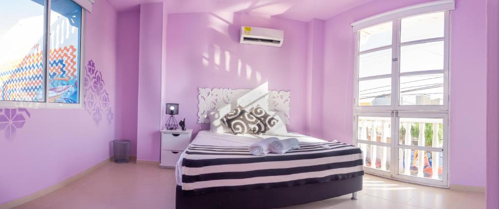 Postel nebo postele na pokoji v ubytování San Felicin Hostel