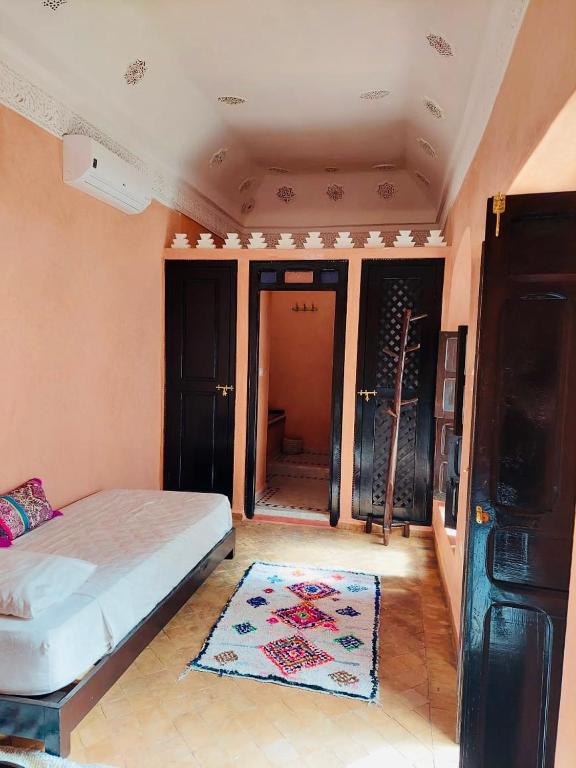 Uma cama ou camas num quarto em Riad Dialna