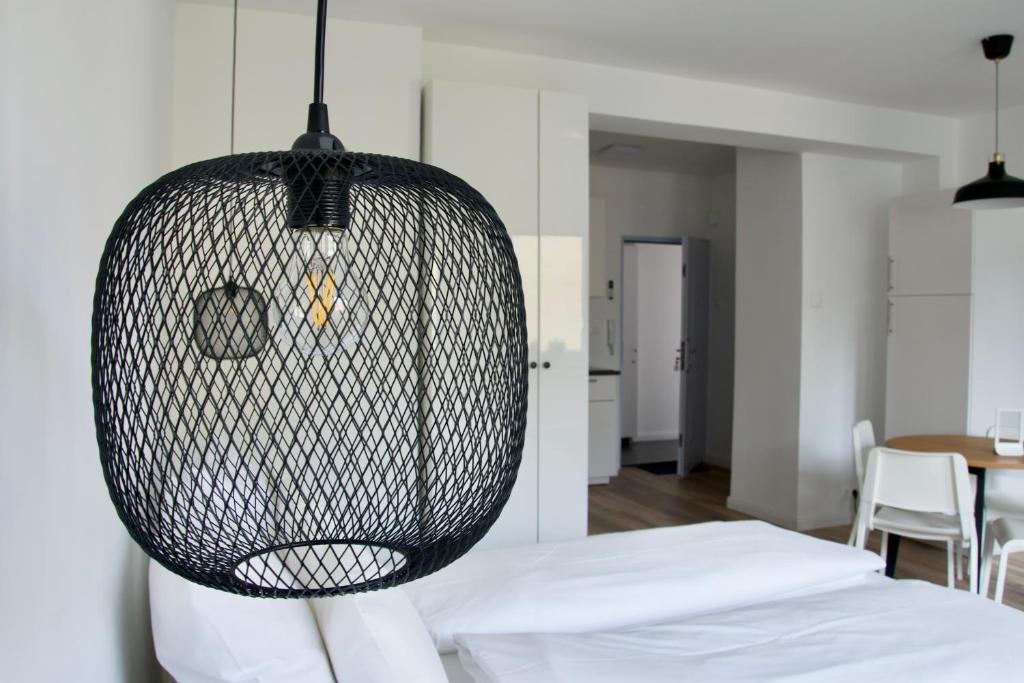 Postel nebo postele na pokoji v ubytování Standard Apartment by Hi5 - Dessewffy 37 suites