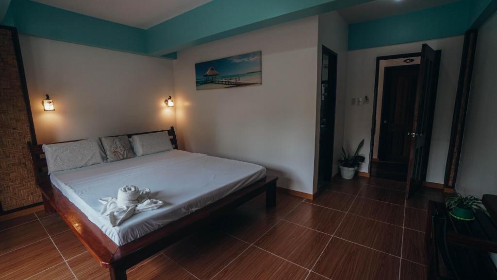 Postel nebo postele na pokoji v ubytování Point 303 Resort