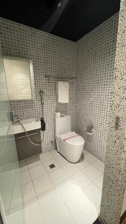 Un baño de Weifeng Boutique Business Hotel - Zhanqian Branch