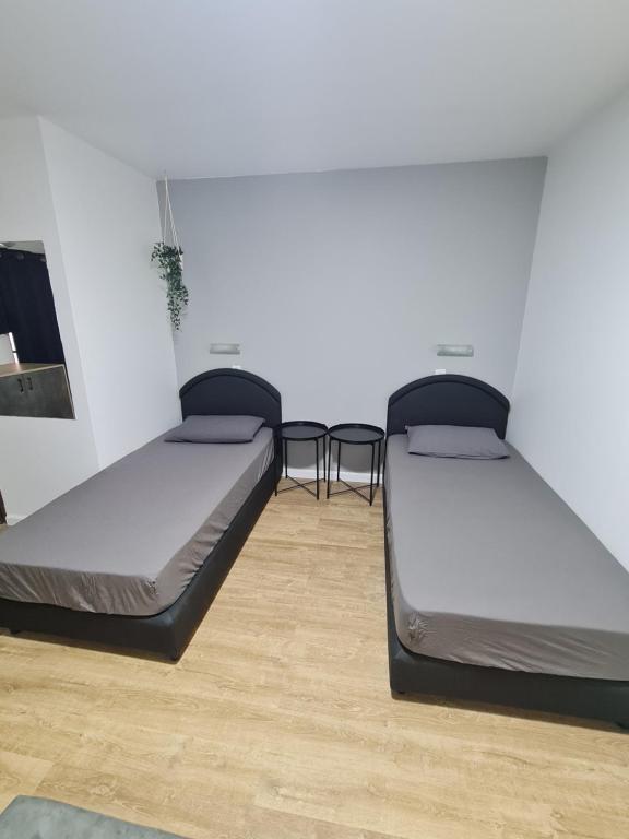 Postel nebo postele na pokoji v ubytování Arava Hostel