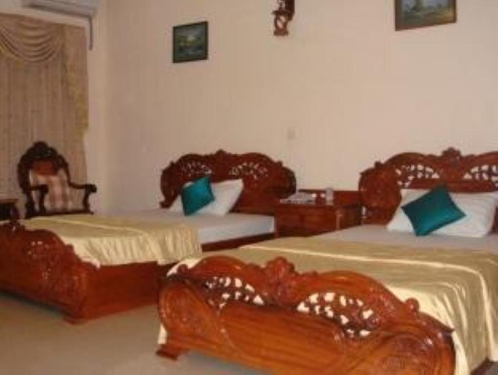 Postel nebo postele na pokoji v ubytování Star Hotel
