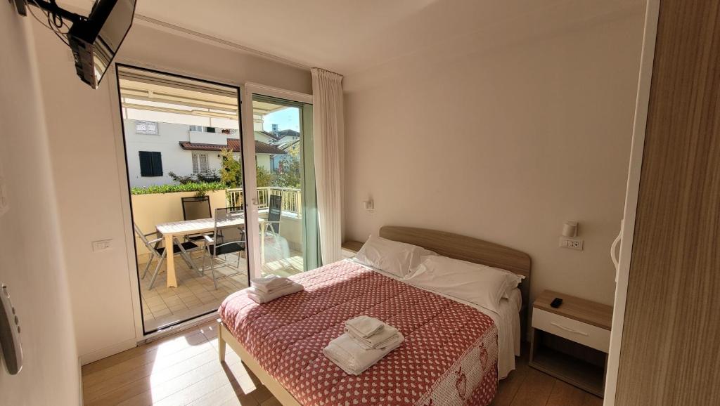 A bed or beds in a room at Antares