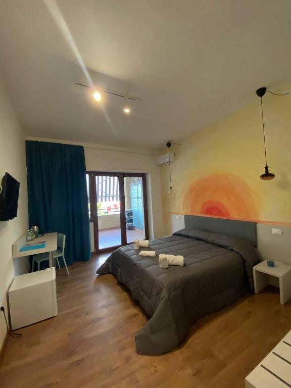 Posteľ alebo postele v izbe v ubytovaní Sorrento B&D Rooms