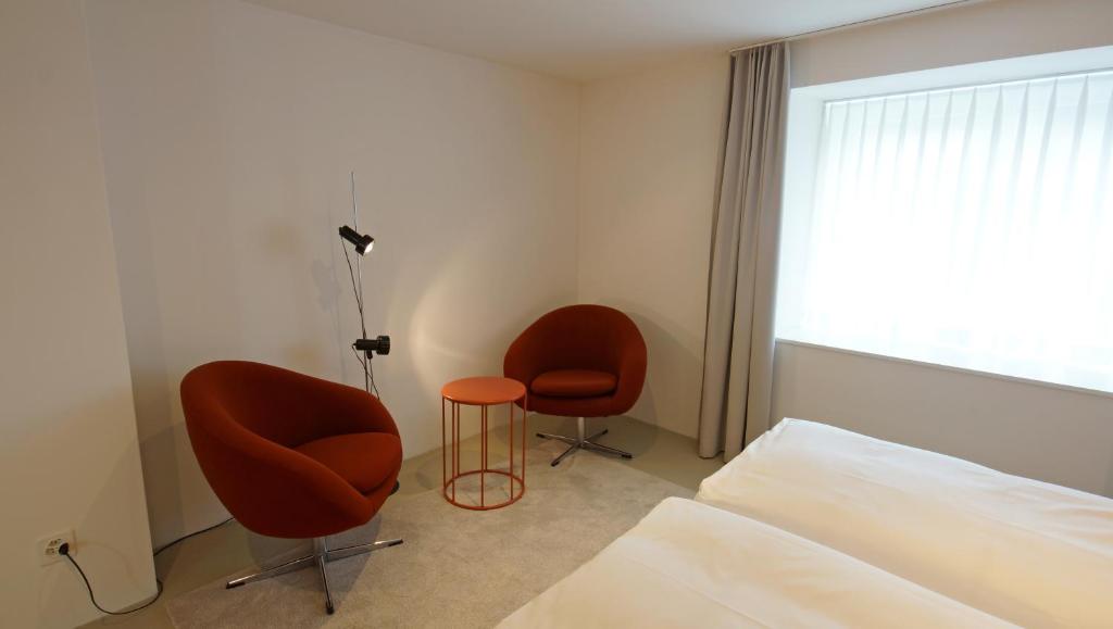 Postel nebo postele na pokoji v ubytování Alte Metzg - Hostel
