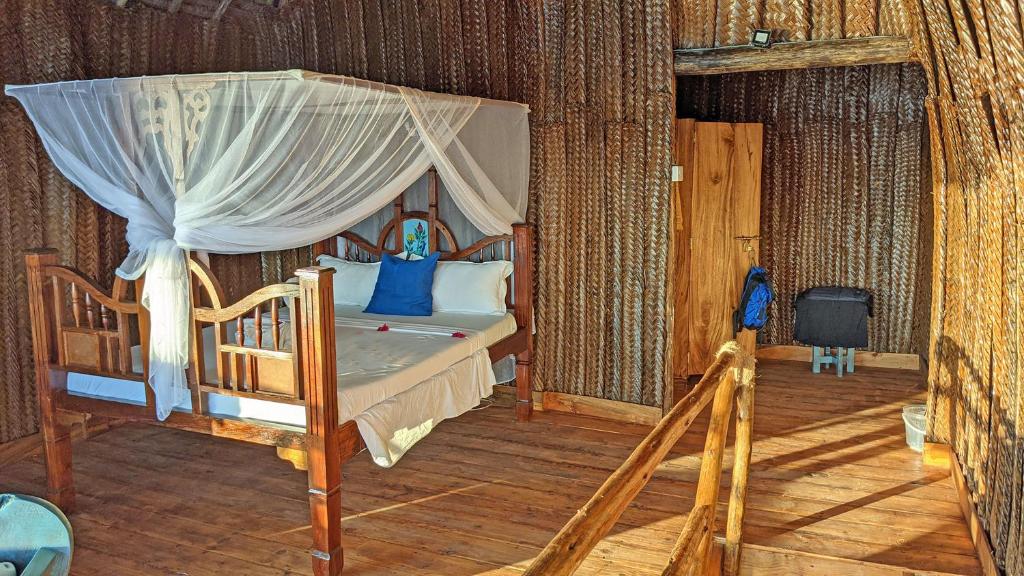 Postel nebo postele na pokoji v ubytování Karamba Eco Boutique Hotel