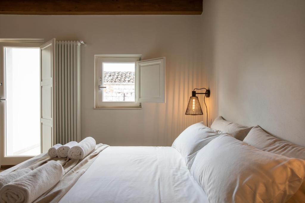 Postel nebo postele na pokoji v ubytování Casa Badia Bed & Breakfast