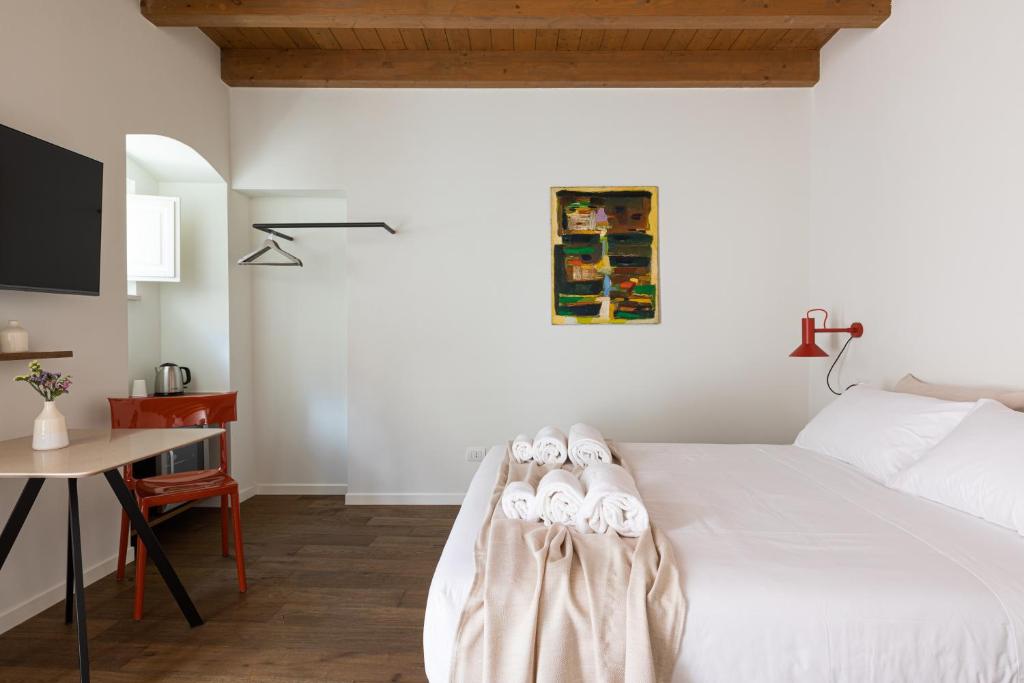 Postel nebo postele na pokoji v ubytování Casa Badia Bed & Breakfast